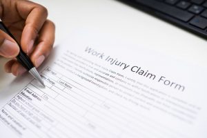filing out a work injury form