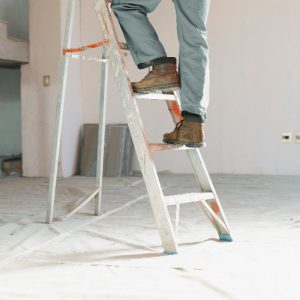 missouri worker climbing a ladder
