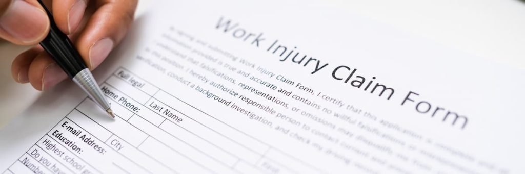 work injury claim form being filled out